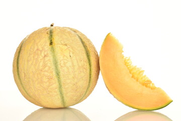  fragrant organic melons, close-up, on a white background.