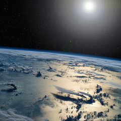 Sunset over the ocean from space. Elements of this image furnished by NASA.
