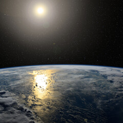 The Earth in space at sunset. Elements of this image furnished by NASA.