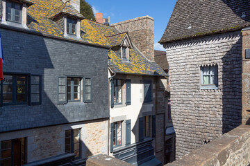 Obraz premium Historic houses in a street of Mont Saint-Michel