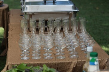 Glasses on a table for a Wedding reception in Newtonia Missouri on a colorful day.