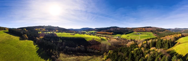 Fotobehang Blauwe hemel a rural countryside landscape sauerland germany as a high definition panorama  © Tobias Arhelger