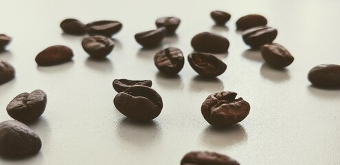 coffee beans scattered across a table