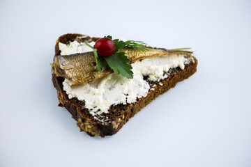 sandwiches with sprats on a white background
