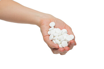 Woman's hand with a bunch of large white pills