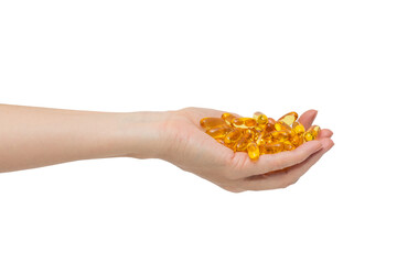 Fototapeta premium Female hand with a bunch of omega-3 capsules
