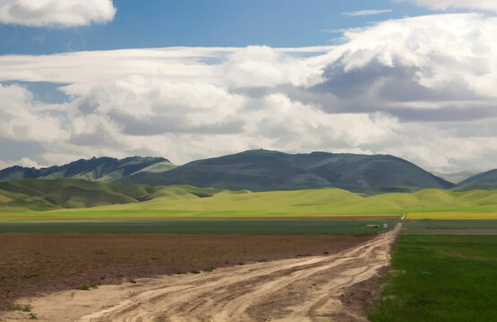 San Joaquin valley farmland with heavy clouds
