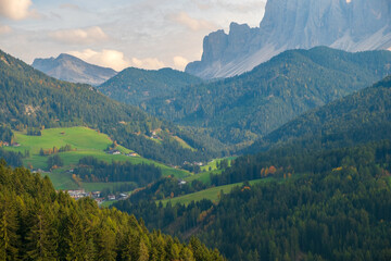 Typical beautiful landscape in the Dolomites, Val di Funes valley in the background with the Odle mountains