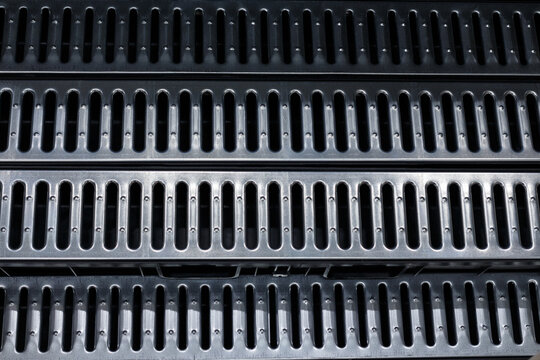 Drainage tray with metal grating, soft focus.