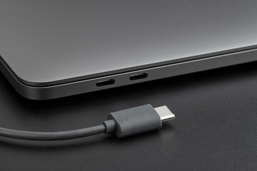 Close-up photo of laptop with type-c cable