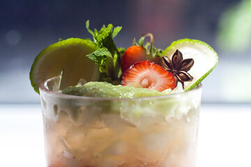 cocktail with strawberry and mint