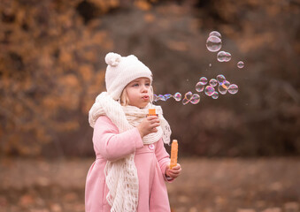  Girl, garden, pink coat, soap bubble blower