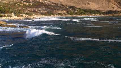 Atlantic breaking waves in slow motion on the coast near Cape Town