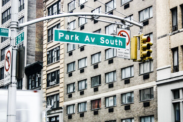 street signs at crossroads in the downtown district of new york, concept of giving direction, Park...
