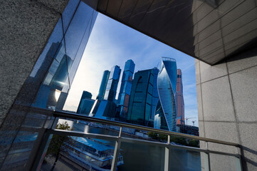 Obraz na płótnie Canvas Skyscrapers in frame of granite and steel, business office buildings in commercial district, construction industry concept, modern architecture