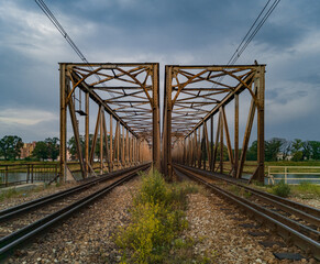 Fototapeta na wymiar Rails at railway bridge over river in Wroclaw