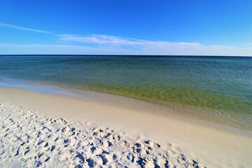 Sand, ocean, sky, tranquility and relaxation, photo taken on the beach of Santa Rose Island, Gulf of Mexico