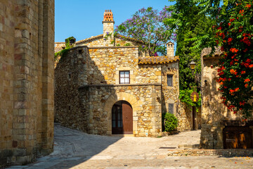 Cozy narrow little streets in a Catalan fishing village on the Costa Brava, Mediterranean Sea