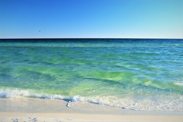 Sand, ocean, sky, tranquility and relaxation, photo taken on the beach of Santa Rose Island, Gulf of Mexico