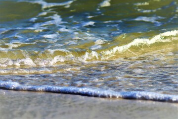 Ocean water, shore of a sandy beach