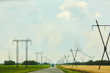 Fototapeta na wymiar power lines and road