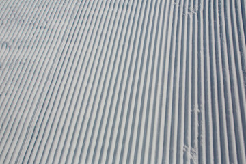 Obraz premium pattern of groomed snow in ski area