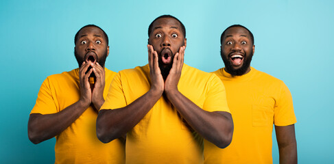 Black man with wondered, surprised and happy expression on cyan background