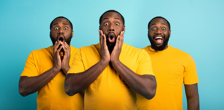 Black Man With Wondered, Surprised And Happy Expression On Cyan Background