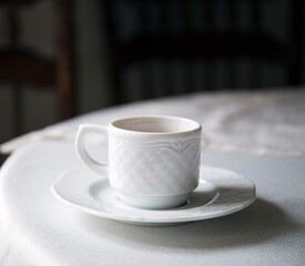 Coffee cup placed on a white table
