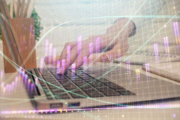 Multi exposure of woman hands typing on computer and forex chart hologram drawing. Stock market analysis concept.