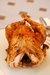 slow roasted turkey or chicken basted with oil and herbs and cooked in the oven