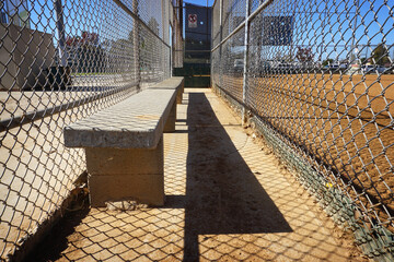 Baseball dugout with bench
