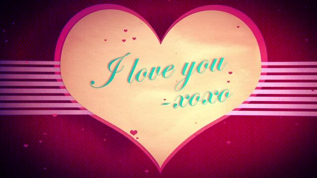 Hot Pink motion background with the text from someone saying "I love you -xoxo" sitting on top of a large floating paper cutout heart that is perfect for sharing with a loved one for Valentine's Day!