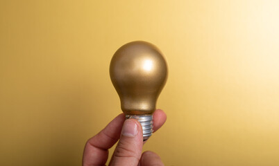 idea lamp gold with gold background