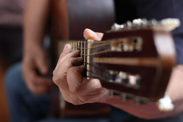 Different hands activities. Playing Guitar
