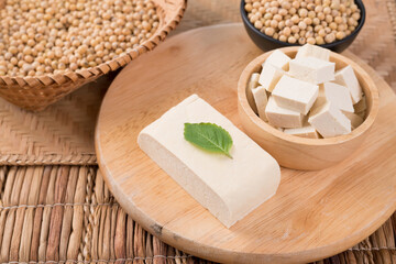 Fresh cube tofu and soybean seeds in a bowl prepare for cooking, Asian vegan food