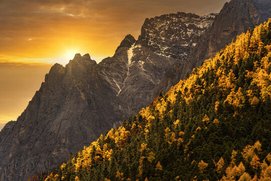 Scene of sunset at The mountain in autumn season in yading nature reserve, Daocheng County, southwest of Sichuan Province, China.travel destination and tourism,famous place and landmark concept.