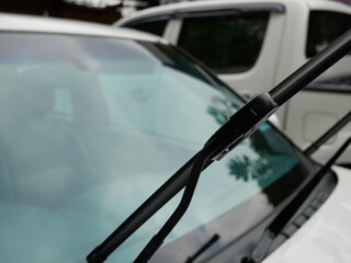 Fototapeta na wymiar closeup of car windshield wiper and raised up.