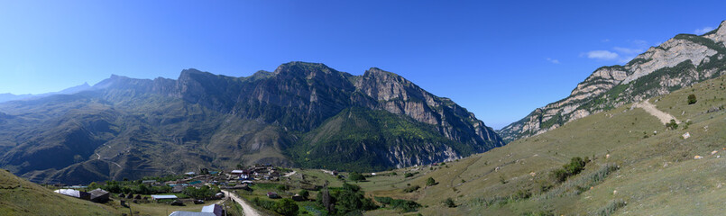 Fototapeta na wymiar view of the village in the mountains, mountain landscape, mountain panorama