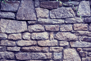 Mur en pierre de granit .