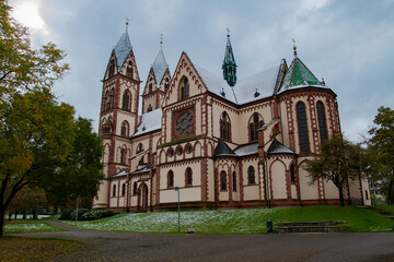 Fototapeta na wymiar Freiburg im Breisgau/Germany - 10 28 2012: Herz-Jesu-Kirche in Freiburg in a cloudy autumn day after first snow