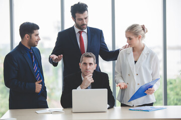 young businessmen using touchpad at meeting. Businesspeople discussing together in conference room during meeting at office