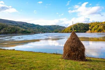 Beautiful shot of the Romanian village flooded by a toxic lake, Apuseni, Romania