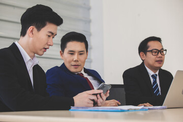 Close up of a man using mobile smart phone