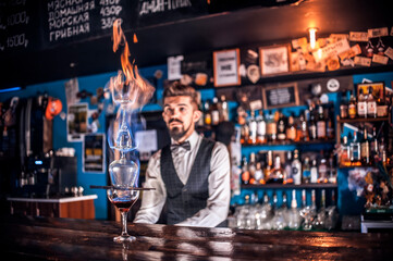 Charismatic bartender surprises with its skill bar visitors in cocktail bars