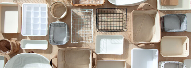 Flat lay of Marie Kondo's storage boxes, containers and baskets with different sizes and shapes