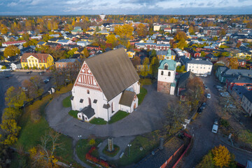 Medieval Lutheran cathedral in a cityscape on a sunny October day (aerial photography). Porvoo, Finland