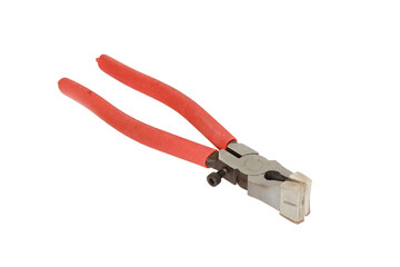 Closeup of a running pliers with red handles isolated on white background