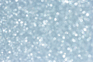 blurry background with glitter. abstract shining silver background.