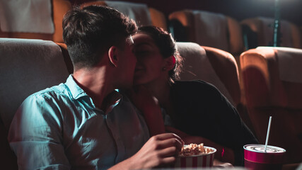 People audience watching movie in the movie theater cinema. Group recreation activity and...